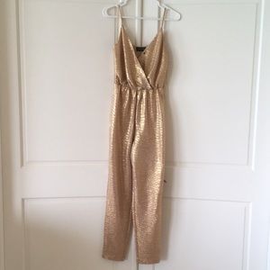 Gold jumpsuit.